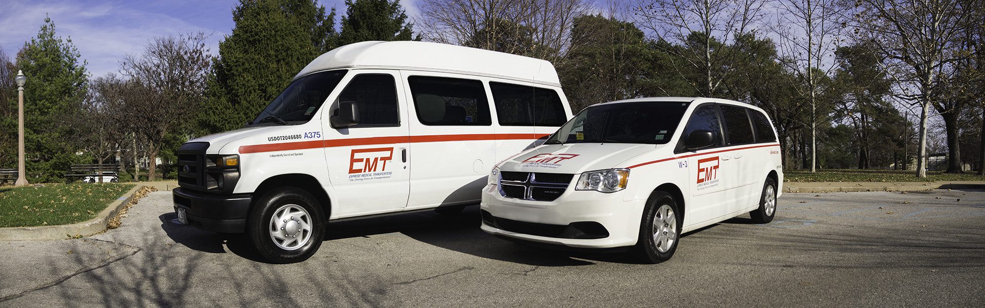 Two White EMT Vehicles